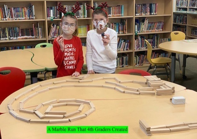 Photo of 4th graders with Marble Run